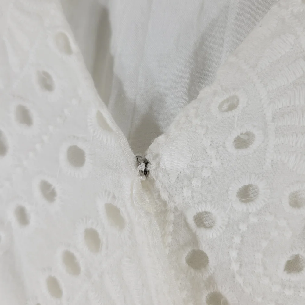 EVERLY white eyelet surplice faux wrap belted cotton ruffle hem romper